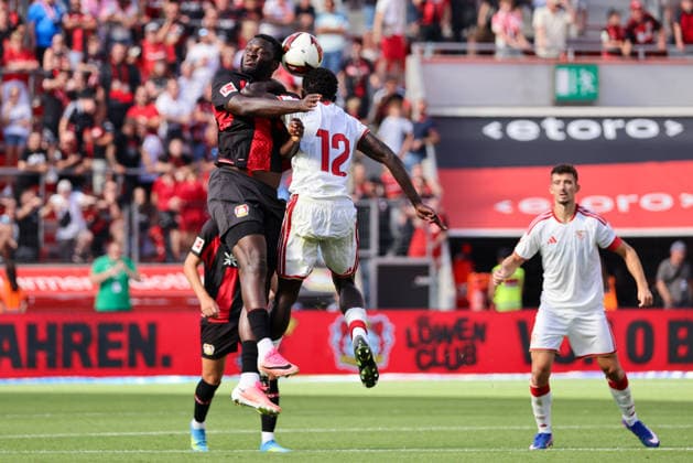 Leverkusen, Deutschland: 08.08.2026 - Saisoneröffnung Testspiel - Bayer 04 Leverkusen vs. FC Sevilla Im Bild: v.li. Victor Boniface (Leverkusen) und Arouna Sangante (Sevilla) im Kopfballduell (DFL DFB REGULATIONS PROHIBIT ANY USE OF PHOTOGRAPHS as IMAGE SEQUENCES and or QUASI-VIDEO) *** *** Leverkusen, Germany, August 8, 2026 Season Opener Friendly Match: Bayer 04 Leverkusen vs. FC Sevilla Pictured from left: Victor Boniface (Leverkusen) and Arouna Sangante (Sevilla) in a header duel DFL DFB REGULATIONS PROHIBIT ANY USE OF PHOTOGRAPHS as IMAGE SEQUENCES and or QUASI-VIDEO *** Copyright: HMBxMedia MadeleinexFantini