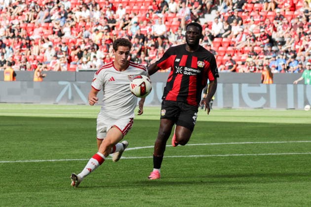 08.08.2026, xgrfx, Fussball Testspiel, Bayer Leverkusen - FC Sevilla v.l. Bueno Manu (FC Sevilla), Victor Boniface (Bayer Leverkusen) (DFL DFB REGULATIONS PROHIBIT ANY USE OF PHOTOGRAPHS as IMAGE SEQUENCES and or QUASI-VIDEO) Leverkuseb *** August 8, 2026, xgrfx, Soccer Friendly Match, Bayer Leverkusen vs. FC Sevilla, Manu Bueno, FC Sevilla, Victor Boniface, Bayer Leverkusen. DFL and DFB regulations prohibit any use of photographs as image sequences and or quasi-video. Leverkuseb