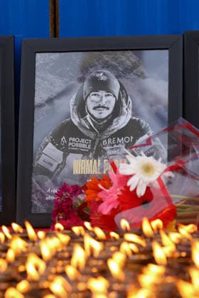 Tribute Continues To Pour For Broad Peak Avalanche Killed Climbers In Nepal People light butter-fed lamps in front of the portrait of British-Nepali climber Nirmal Purja who died in an avalanche while making the summit of the Broad Peak, in Kathmandu, Nepal, on August 8, 2026. Tributes have continued for the Nepali climbers who died in the Broad Peak avalanche. The Tribute Run 5K paid tribute to the climbers who perished in the avalanche that struck the world s 12th highest peak at the end of July. Runners held a vigil lighting butter-fed lamps in front of the photo of the climbers upon reaching the Bouddhanath Stupa, the finish line of the marathon. Portraits of British-Nepali climber Nirmal Purja, Nima Sherpa, Nawang Thindu Sherpa, Pur Bahadur Gurung, Kili Pemba Sherpa and Gyalu Sherpa were kept facing the UNESCO World Heritage Site Bouddhanath Stupa during the vigil. Rescuers retrieved four of the bodies of the climbers on August 2, 2026. A total of 7 bodies has been recovered from the peak with three still on the slopes of one of the technical peaks. The body of one Nepali climber is yet to be retrieved while three other bodies have been brought to Skardu in Gilgit Baltistan where procedures are being completed for the retrieval back home. KATHMANDU Bagmati Nepal  Copyright: xSubaasxShresthax originalFilename:shrestha-tributec260808_npxQO.jpg