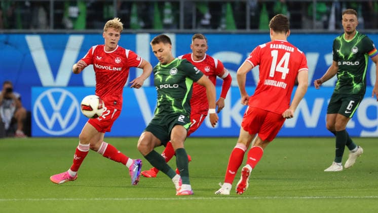 VfL vs. 1. FCK , 2. BL Wolfsburg, 08.08.2026, Fußball, Herren, 2. BL, Saison 2026 2027, VfL Wolfsburg vs. 1. FC Kaiserslautern: Mika Haas (1. FC Kaiserslautern), Kilian Fischer (VfL Wolfsburg) (DFL DFB REGULATIONS PROHIBIT ANY USE OF PHOTOGRAPHS as IMAGE SEQUENCES and or QUASI-VIDEO) Volkswagen Arena Niedersachsen Deutschland *** VfL vs. 1 FCK, 2. Bundesliga Wolfsburg, August 8, 2026, Soccer, Men s, 2. Bundesliga, 2026–2027 Season, VfL Wolfsburg vs. 1. FC Kaiserslautern, Mika Haas (1. FC Kaiserslautern), Kilian Fischer (VfL Wolfsburg). DFL and DFB regulations prohibit any use of photographs as image sequences and or quasi-video. Volkswagen Arena, Lower Saxony, Germany