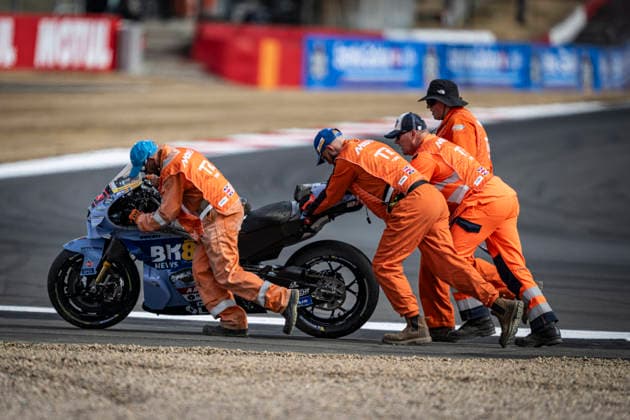 RECORD DATE NOT STATED 8th August 2026; Silverstone Circuit, Northamptonshire, England; 2026 MotoGP Grand Prix of Great Britain, Qualifying Day; Marshals push the bike of Iker Lecuona of the BK8 Gresini Racing Team off the track after his crash during the Tissot sprint race GodfreyxPitt