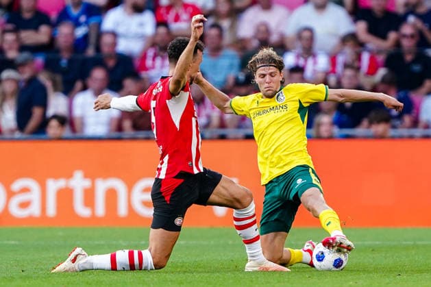 2026-08-08 PSV Eindhoven v Fortuna Sittard - Dutch Eredivisie EINDHOVEN, NETHERLANDS - AUGUST 8: Jasper Dahlhaus of Fortuna Sittard battles for possession with Ivan Perisic of PSV Eindhoven during the Dutch Eredivisie match between PSV Eindhoven and Fortuna Sittard at Philips Stadion on August 8, 2026 in Eindhoven, Netherlands. Eindhoven Philips Stadion Netherlands Content not available for redistribution in The Netherlands directly or indirectly through any third parties. Copyright: xAndrexWeeningx