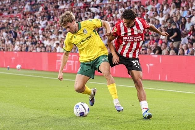 EINDHOVEN , 08-08-2026 , Philips stadium , season 2026 2027 , Dutch Eredivisie football , match between PSV and Fortuna Sittard , picture shows PSV player Sven Mijnans Fortuna Sittard player Siebe Wylin and PSV Player Amir Bouhamdi PSV - Fortuna  x205557713x Copyright: