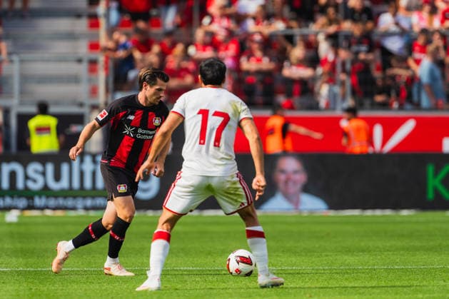 Jonas Hofmann (Bayer 04 Leverkusen, 07) am Ball gestellt von Alfon (FC Sevilla, 17) Bayer 04 Leverkusen vs. FC Sevilla, Fussball, Saisoneroeffnungspiel, Freundschaftsspiel, Saison 2026 27, 08.08.2026, DFL REGULATIONS PROHIBIT ANY USE OF PHOTOGRAPHS AS IMAGE SEQUENCES AND OR QUASI-VIDEO, Bayer 04 Leverkusen vs. FC Sevilla, Fussball, Saisoneroeffnungsspiel, Freundschaftsspiel, Saison 2026 27, 08.08.2026 Leverkusen *** Jonas Hofmann, Bayer 04 Leverkusen, 07, in possession of the ball against Alfon, FC Sevilla, 17, Bayer 04 Leverkusen vs. FC Sevilla, soccer, season opener, friendly match, 2026–27 season, August 8, 2026, DFL regulations prohibit any use of photographs as image sequences and or quasi-video, Bayer 04 Leverkusen vs. FC Sevilla, soccer, season opener, friendly match, 2026–27 season, August 8, 2026, Leverkusen Copyright: xEibner-Pressefoto LukasxBaldygax EP_LBA