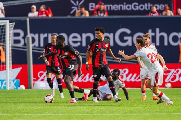 Aleix Garcia (Bayer 04 Leverkusen, 24), Victor Boniface (Bayer 04 Leverkusen, 22) gewinnt den Ball, Malik Tillman (Bayer 04 Leverkusen, 10), Lucien Agoume (FC Sevilla, 06) am Boden, Manuel Bueno (FC Sevilla, 28) Bayer 04 Leverkusen vs. FC Sevilla, Fussball, Saisoneroeffnungspiel, Freundschaftsspiel, Saison 2026 27, 08.08.2026, DFL REGULATIONS PROHIBIT ANY USE OF PHOTOGRAPHS AS IMAGE SEQUENCES AND OR QUASI-VIDEO, Bayer 04 Leverkusen vs. FC Sevilla, Fussball, Saisoneroeffnungsspiel, Freundschaftsspiel, Saison 2026 27, 08.08.2026 Leverkusen *** Aleix Garcia, Bayer 04 Leverkusen, 24; Victor Boniface, Bayer 04 Leverkusen, 22, wins the ball; Malik Tillman, Bayer 04 Leverkusen, 10; Lucien Agoume, FC Sevilla, 06, on the ground; Manuel Bueno (FC Sevilla, 28), Bayer 04 Leverkusen vs. FC Sevilla, soccer, season opener, friendly match, 2026–27 season, August 8, 2026, DFL regulations prohibit any use of photographs as image sequences and or quasi-video, Bayer 04 Leverkusen vs. FC Sevilla, soccer, season opener, friendly match, 2026–27 season, August 8, 2026, Leverkusen Copyright: xEibner-Pressefoto LukasxBaldygax EP_LBA