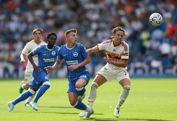 Pre Season Friendly - Brighton & Hove Albion v AS Roma BRIGHTON, ENGLAND, AUGUST 8: Joao Costinha of Brighton & Hove Albion battles for the ball with Filippo Reale of AS Roma during the Pre Season Friendly match between Brighton & Hove Albion v AS Roma at AMEX Community Stadium, Brighton on 8 August. (Photo by Daniel Weir) Brighton AMEX Community Stadium United Kingdom Copyright: xDanielxWeir SportsxPressxPhotox Sportspressphoto_SPR202628