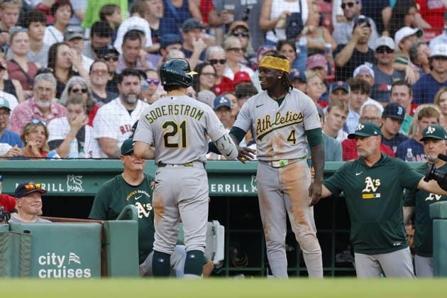 Athletics Tyler Soderstrom, left, is greeted by Athletics Lawrence Butler, right, after Soderstrom hit solo home run during the seventh inning against the Boston Red Sox at Fenway Park in Boston, Massachusetts on Saturday, August 8, 2026.  BOP2026080816 CJxGUNTHER