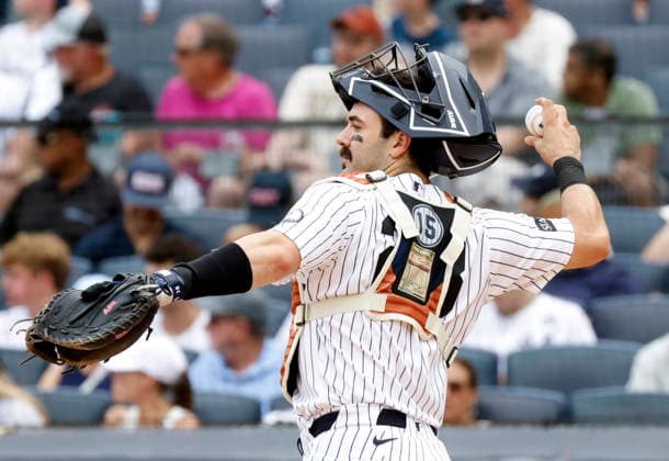 New York Yankees catcher Austin Wells pays tribute to late Yankees legend Thurman Munson by wearing his number 15 and baseball card showing his statistics against the Atlanta Braves at Yankee Stadium on Saturday, August 8, 2026 in New York City.  NYP20260808104 JOHNxANGELILLO