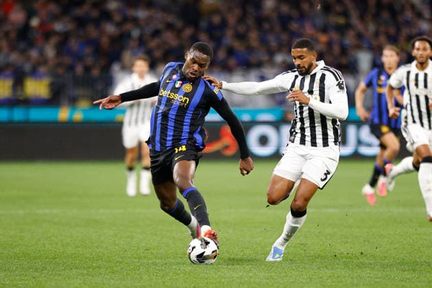 SOCCER JUVENTUS INTER, Inters Ange-Yoan Bonny 14 gets challenged by Juventus Gleison Bremer Silva Nascimento 3 during the soccer exhibition match between Juventus and Inter Milan at Optus Stadium in Perth, Saturday, August, 8, 2026. ( NO ARCHIVING PERTH WESTERN AUSTRALIA AUSTRALIA  Copyright: xINGOxBURKHARDTx 20260809161748706805