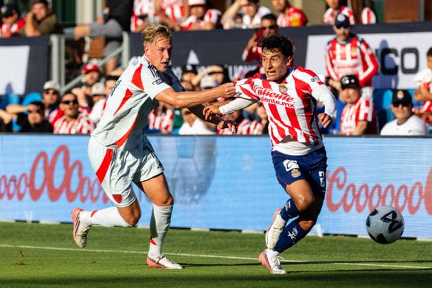 SAN JOSE, CA - AUGUST 08: Herman Johansson 14 of FC Dallas pulls on the jersey of Miguel Gomez 24 of Chivas de Guadalajara during a Leagues Cup Phase One match on August 8, 2026 at PayPal Park in San Jose, CA. (Photo by Matthew Huang Icon Sportswire) SOCCER: AUG 08 Leagues Cup Chivas de Guadalajara vs Dallas EDITORIAL USE ONLY Icon260808002