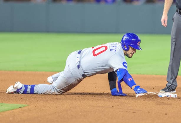 AUG 08, 2026: Chicago Cubs designated hitter Michael Conforto (20) slides into second base after hitting a double in the 9th inning against the Kansas City Royals at Kauffman Stadium Kansas City, MO. CSM MLB, Baseball Herren, USA 2026: Cubs Vs Royals Aug 8th  - ZUMAc04_ 20260808_zma_c04_350 Copyright: xRomanxPunox