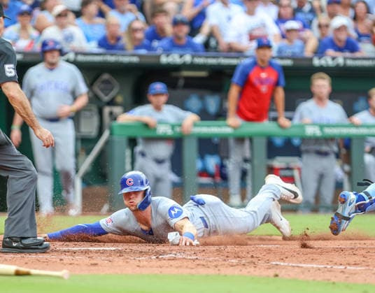 AUG 08, 2026: Chicago Cubs second baseman Nico Hoerner (2) dives into home plate and scores in the 4th inning against the Kansas City Royals at Kauffman Stadium Kansas City, MO. CSM MLB, Baseball Herren, USA 2026: Cubs Vs Royals Aug 8th  - ZUMAc04_ 20260808_zma_c04_393 Copyright: xRomanxPunox
