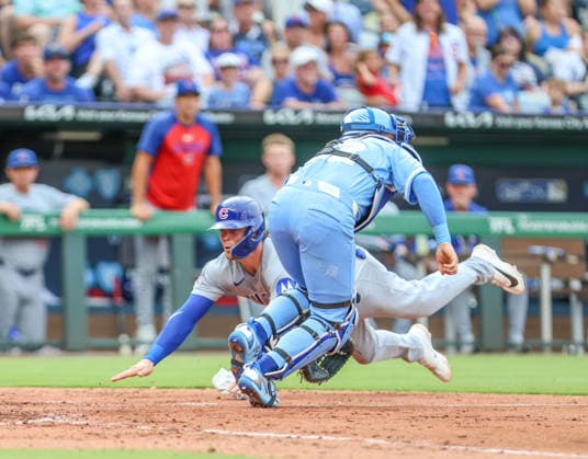 AUG 08, 2026: Chicago Cubs second baseman Nico Hoerner (2) dives into home plate and scores in the 4th inning against the Kansas City Royals at Kauffman Stadium Kansas City, MO. CSM Kansas City United States - ZUMAc04_ 20260808_zma_c04_377 Copyright: xRomanxPunox