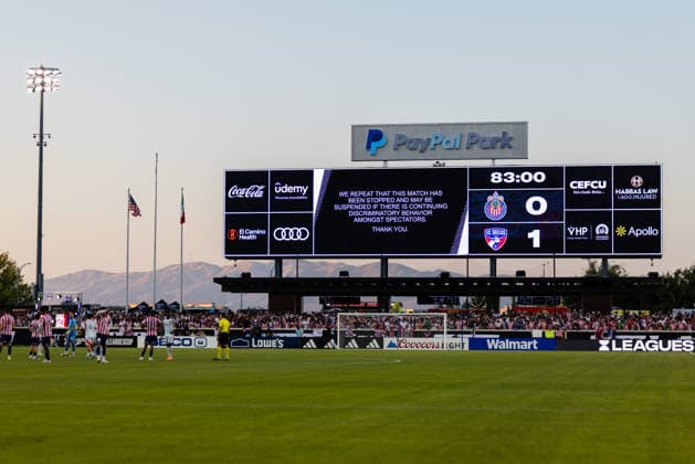 SAN JOSE, CA - AUGUST 08: The video board displays a message that play has been stop due to discriminatory behavior by fans during a Leagues Cup Phase One match between Chivas de Guadalajara and FC Dallas on August 8, 2026 at PayPal Park in San Jose, CA. (Photo by Matthew Huang Icon Sportswire) SOCCER: AUG 08 Leagues Cup Chivas de Guadalajara vs Dallas EDITORIAL USE ONLY Icon260808023