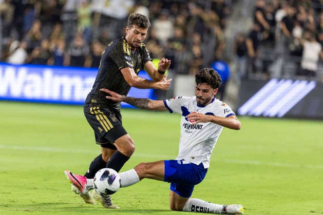 August 8, 2026, Los Angeles, California, USA: Los Angeles FC defender Yevhen Cheberko (23) and Toluca FC defender Santiago Simon (19) vie for the ball during a Leagues Club soccer match on Saturday, Aug. 8, 2026 in Los Angeles. Los Angeles USA - ZUMAc68_ 20260808_zaf_c68_003 Copyright: xRingoxChiux