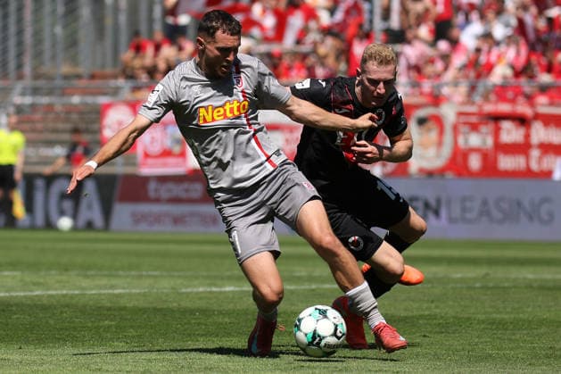 08.08.2026, xsefx, Fußball, FC Viktoria Köln SSV Jahn Regensburg, 3.Liga, Sportpark Höhenberg, 1. Spieltag, Saison 2026 2027: Oscar Schönfelder (Jahn Regensburg 07) im Zweikampf gegen Meiko Sponsel (FC Viktoria Koeln 19) DFB regulations prohibit any use of photographs as image sequences and or quasi-video. Nordrhein-Westfalen Deutschland *** August 8, 2026, xsefx, Soccer, FC Viktoria Köln vs. SSV Jahn Regensburg, 3. Liga, Sportpark Höhenberg, Matchday 1, 2026–2027 Season: Oscar Schönfelder of Jahn Regensburg 07 in a tackle against Meiko Sponsel of FC Viktoria Köln 19. DFB regulations prohibit any use of photographs as image sequences and or quasi-video. North Rhine-Westphalia, Germany