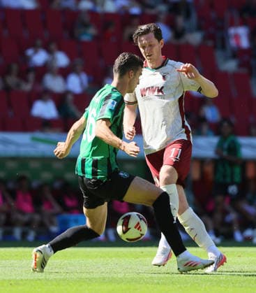 (260809) -- AUGSBURG, Aug. 9, 2026 -- Michael Gregoritsch (R) of FC Augsburg vies with Cas Odenthal of Sassuolo during the friendly football match between FC Augsburg and Sassuolo in Augsburg, Germany, Aug. 8, 2026. (Photo by Xinhua) (SP)GERMANY-AUGSBURG-FOOTBALL-FRIENDLY MATCH-AUGSBURG VS SASSUOLO PhilippexRuiz 