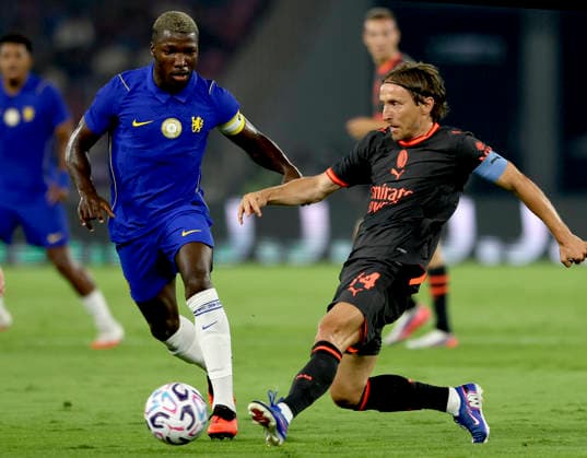 (260809) -- JAKARTA, Aug. 9, 2026 -- Luka Modric (R) of AC Milan competes during a pre-season friendly football match between Chelsea FC and AC Milan at Gelora Bung Karno Stadium in Jakarta, Indonesia, Aug. 8, 2026. (Photo by Xinhua) (SP)INDONESIA-JAKARTA-FOOTBALL-CHELSEA FC VS AC MILAN-FRIENDLY MATCH AirxNakla 