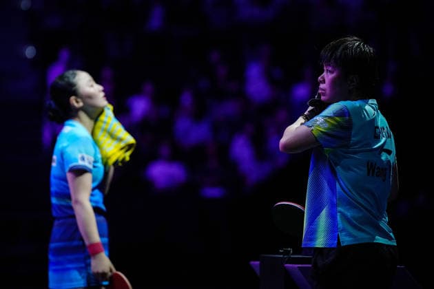 (260809) -- YOKOHAMA, Aug. 9, 2026 -- Wang Yidi (R) of China reacts during the women s singles semifinal match between Harimoto Miwa of Japan and Wang Yidi of China at the WTT Champions Yokohama 2026 in Yokohama, Japan, Aug. 9, 2026. ) (SP)JAPAN-YOKOHAMA Table tennis, Tischtennis WTT CHAMPIONS YOKOHAMA-WOMEN S SINGLES JiaxHaocheng 