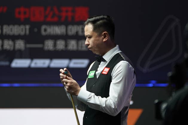 TAIYUAN, CHINA - AUGUST 09: Xiao Guodong of China chalks the cue in the first round match against Anthony McGill of Scotland on day 2 of the 2026 World Snooker Tour China Open at Taiyuan Binhe Sports Center on August 9, 2026 in Taiyuan, Shanxi Province of China.  Copyright: xTaixChengzhex 111658964120