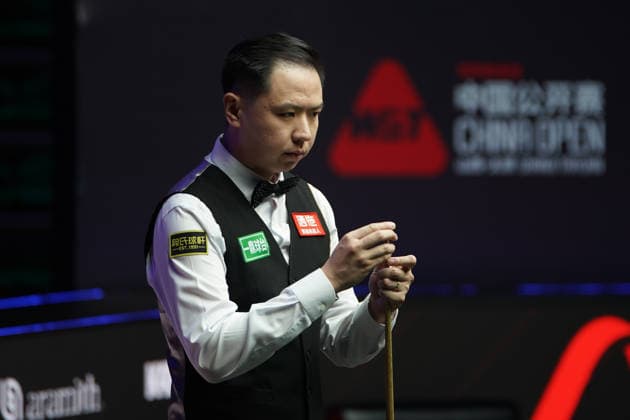TAIYUAN, CHINA - AUGUST 09: Xiao Guodong of China chalks the cue in the first round match against Anthony McGill of Scotland on day 2 of the 2026 World Snooker Tour China Open at Taiyuan Binhe Sports Center on August 9, 2026 in Taiyuan, Shanxi Province of China.  Copyright: xTaixChengzhex 111658964117
