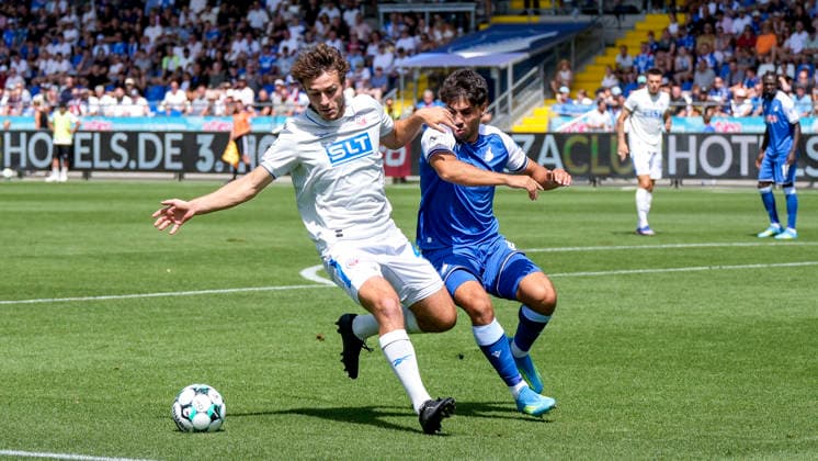 v.li.: Benno Dietze (Rostock, 42), Diren Dagdeviren (TSG II, 8), Zweikampf, Spielszene, Duell, duel, tackle, tackling, Dynamik, Action, Aktion, 09.08.2026, Sinsheim (Deutschland), Fussball, 3. Liga, TSG 1899 Hoffenheim II - Hansa Rostock, DFB DFL REGULATIONS PROHIBIT ANY USE OF PHOTOGRAPHS AS IMAGE SEQUENCES AND OR QUASI-VIDEO. *** v li Benno Dietze Rostock, 42, Diren Dagdeviren TSG II, 8, tackle, game scene, duel, tackle, tackling, dynamic, action, 09 08 2026, Sinsheim, Germany, soccer, 3rd League, TSG 1899 Hoffenheim II vs. Hansa Rostock, DFB and DFL regulations prohibit any use of photographs as image sequences and or quasi-video xozx