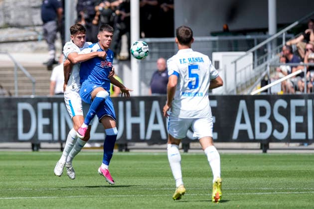 v.li.: Lukas Wallner (Rostock, 16), Jakov Dedic (TSG II, 36), Marco Schuster (Rostock, 5), Zweikampf, Spielszene, Duell, duel, tackle, tackling, Dynamik, Action, Aktion, 09.08.2026, Sinsheim (Deutschland), Fussball, 3. Liga, TSG 1899 Hoffenheim II - Hansa Rostock, DFB DFL REGULATIONS PROHIBIT ANY USE OF PHOTOGRAPHS AS IMAGE SEQUENCES AND OR QUASI-VIDEO. *** From left: Lukas Wallner (Rostock), 16; Jakov Dedic (TSG II), 36; Marco Schuster (Rostock), 5; tackle, game scene, duel, tackle, tackling, dynamism, action, 09 08 2026, Sinsheim, Germany, soccer, 3rd Division, TSG 1899 Hoffenheim II vs. Hansa Rostock, DFB and DFL regulations prohibit any use of photographs as image sequences and or quasi-video xozx
