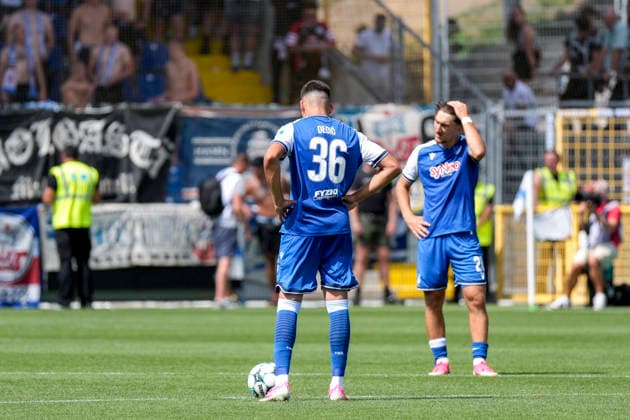 v.li.: Jakov Dedic (TSG II, 36), Florian Micheler (TSG II, 28), Spieler der TSG 1899 Hoffenheim II (U23), enttäuscht schauend, Enttäuschung, Frustration, disappointed, pessimistisch, nach dem Gegentor zum 2:3, Action, Aktion, Spielszene, 09.08.2026, Sinsheim (Deutschland), Fussball, 3. Liga, TSG 1899 Hoffenheim II - Hansa Rostock, DFB DFL REGULATIONS PROHIBIT ANY USE OF PHOTOGRAPHS AS IMAGE SEQUENCES AND OR QUASI-VIDEO. *** From left: Jakov Dedic (TSG II), 36, Florian Micheler (TSG II), 28, players from TSG 1899 Hoffenheim II U23, looking disappointed, disappointment, frustration, pessimistic, after conceding the goal that made the score 2–3, action, game scene, August 9, 2026, Sinsheim, Germany, soccer, 3. Liga, TSG 1899 Hoffenheim II vs. Hansa Rostock, DFB and DFL regulations prohibit any use of photographs as image sequences and or quasi-video xozx