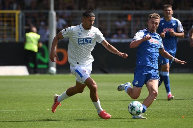 09.08.2026, xhbx, Fussball 3.Liga, TSG 1899 Hoffenheim U23 - Hansa Rostock v.l. Ouassim Karada (Hansa Rostock), Alex Honajzer (TSG 1899 Hoffenheim U23) (DFL DFB REGULATIONS PROHIBIT ANY USE OF PHOTOGRAPHS as IMAGE SEQUENCES and or QUASI-VIDEO) Hoffenheim *** August 9, 2026, xhbx, Soccer 3rd Division, TSG 1899 Hoffenheim U23 vs. Hansa Rostock, Ouassim Karada (Hansa Rostock), Alex Honajzer, TSG 1899 Hoffenheim U23. DFL and DFB regulations prohibit any use of photographs as image sequences and or quasi-video. Hoffenheim
