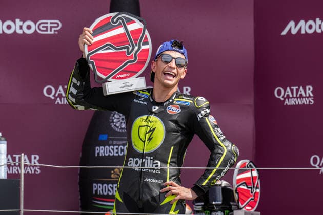 Raul Fernandez (Spain) of the SuperFile Trackhouse MotoGP Team ( 25) celebrates on the podium after winning the MotoGP Race at Round 12 of the 2026 Qatar Airways Grand Prix of Great Britain at Silverstone Circuit, Towcester, England on the 9 August 2026.  Copyright: xDavidxHornx PMI-7310-0265