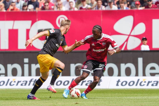 Jonas Sterner (Dynamo Dresden, 32) und Mohamed Ali Zoma (1. FC Nuernberg, 23), GER, 1. FC Nuernberg vs. Dynamo Dresden, Fussball, 2. Bundesliga, 1. Spieltag, Saison 2026 2027, 09.08.2026, DFL REGULATIONS PROHIBIT ANY USE OF PHOTOGRAPHS AS IMAGE SEQUENCES AND OR QUASI-VIDEO, GER, 1. FC Nuernberg vs. Dynamo Dresden, Fussball, 2. Bundesliga, 1. Spieltag, Saison 2026 2027, 09.08.2026, Nuernberg *** Jonas Sterner, Dynamo Dresden, 32, and Mohamed Ali Zoma, 1 FC Nuremberg, 23, GER, 1 FC Nuremberg vs. Dynamo Dresden, Soccer, 2. Bundesliga, Matchday 1, 2026–2027 Season, August 9, 2026, DFL regulations prohibit any use of photographs as image sequences and or quasi-video, GER, 1. FC Nuremberg vs. Dynamo Dresden, soccer, 2. Bundesliga, Matchday 1, 2026–2027 Season, August 9, 2026, Nuremberg Copyright: xEibner-Pressefoto MaxxVogelx EP_MVL