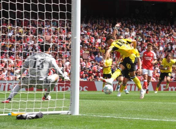 Football - 2026 Emirates Cup (pre-season friendly) - Arsenal vs. Borussia Dortmund - Emirates Stadium - Sunday 9th August 2026 Samuele Inacio of Borussia Dortmund scores goal no 1 past goalkeeper, Kepa Arrizabalaga 