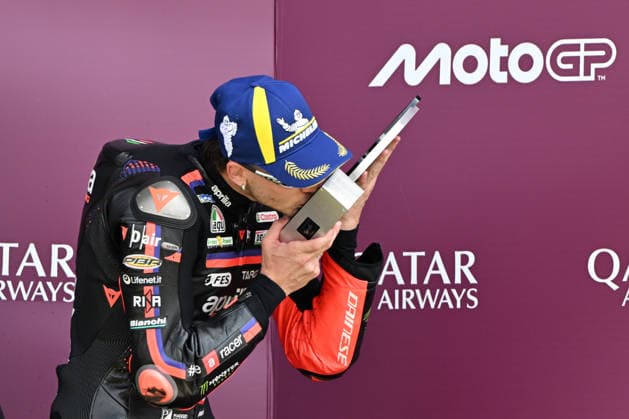 RECORD DATE NOT STATED 9th August 2026; Silverstone Circuit, Northamptonshire, England; 2026 MotoGP Grand Prix of Great Britain, Race Day; Marco Bezzecchi of Aprilia Racing celebrates with the third place trophy in the MotoGP Grand Prix of Great Britain SimonxWest