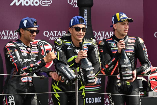 RECORD DATE NOT STATED 9th August 2026; Silverstone Circuit, Northamptonshire, England; 2026 MotoGP Grand Prix of Great Britain, Race Day; Jorge Martin of Aprilia Racing, Raul Fernandez of SuperFile Trackhouse MotoGP Team and Marco Bezzecchi of Aprilia Racing with Prosecco bottles SimonxWest