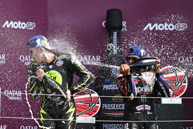 RECORD DATE NOT STATED 9th August 2026; Silverstone Circuit, Northamptonshire, England; 2026 MotoGP Grand Prix of Great Britain, Race Day; Jorge Martin of Aprilia Racing and Raul Fernandez of SuperFile Trackhouse MotoGP Team with Prosecco SimonxWest