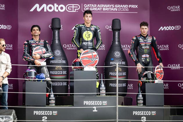 RECORD DATE NOT STATED 9th August 2026; Silverstone Circuit, Northamptonshire, England; 2026 MotoGP Grand Prix of Great Britain, Race Day; Raul Fernandez of the Superfile Trackhouse Team celebrates on the podium after winning the Qatar Airways British Grand Prix MotoGP with Jorge Martin of the Aprilia Racing Team in second and Marco Bezzecchi of the Aprilia Racing Team in third GodfreyxPitt