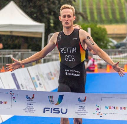 August 9, 2026, Nyon, Vaud, Switzerland: Nyon Switzerland, 08 09 2026: BETTIN BENEDIKT of Germany wins the race and takes the gold medal at the international university championship during FISU World University Championship Triathlon Nyon 2026 (International University Sports Federation). The NyonTriathlon is the final of the FISU World University Triathlon Championship which also the 37th edition and took place at Nyon in Vaud in Switzerland. Nyon Switzerland - ZUMAd206 20260809_zip_d206_002 Copyright: xEricxDubostx