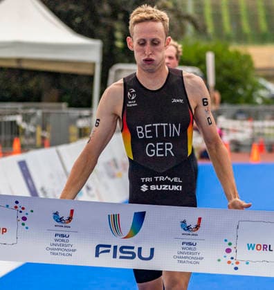August 9, 2026, Nyon, Vaud, Switzerland: Nyon Switzerland, 08 09 2026: BETTIN BENEDIKT of Germany wins the race and takes the gold medal at the international university championship during FISU World University Championship Triathlon Nyon 2026 (International University Sports Federation). The NyonTriathlon is the final of the FISU World University Triathlon Championship which also the 37th edition and took place at Nyon in Vaud in Switzerland. Nyon Switzerland - ZUMAd206 20260809_zip_d206_003 Copyright: xEricxDubostx