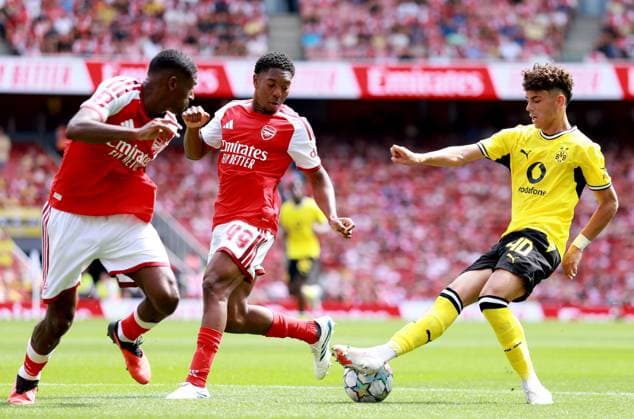 Samuele Inacio of Borussia Dortmund in action against Cristhian Mosquera of Arsenal Arsenal v Borussia Dortmund, Pre Season Friendly, Football, Emirates Stadium, London, UK - 09 Aug 2026London Emirates Stadium United Kingdom EDITORIAL USE ONLY No use with unauthorised audio, video, data, fixture lists, club league logos or live services. Online in-match use limited to 120 images, no video emulation. No use in betting, games or single club league player publications.  Copyright: xGeorgexTewkesbury Shutterstockx 17051143am