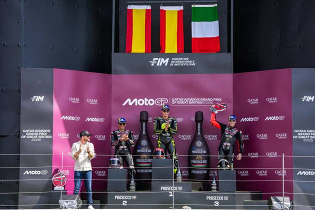 Jorge Martin (Spain) of the Aprilia Racing ( 89) (2nd), Raul Fernandez (Spain) of the SuperFile Trackhouse MotoGP Team ( 25) (1st) and Marco Bezzecchi (Italy) of the Aprilia Racing ( 72) (3rd) on the podium after the MotoGP Race at Round 12 of the 2026 Qatar Airways Grand Prix of Great Britain at Silverstone Circuit, Towcester, England on the 9 August 2026.  Copyright: xDavidxHornx PMI-7310-0290