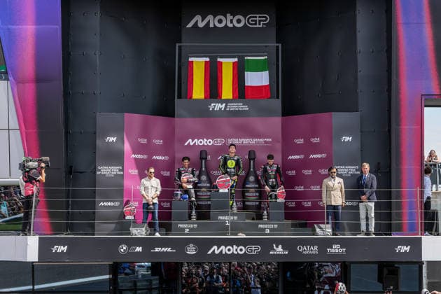 Jorge Martin (Spain) of the Aprilia Racing ( 89) (2nd), Raul Fernandez (Spain) of the SuperFile Trackhouse MotoGP Team ( 25) (1st) and Marco Bezzecchi (Italy) of the Aprilia Racing ( 72) (3rd) on the podium after the MotoGP Race at Round 12 of the 2026 Qatar Airways Grand Prix of Great Britain at Silverstone Circuit, Towcester, England on the 9 August 2026.  Copyright: xDavidxHornx PMI-7310-0292