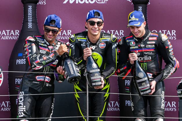 Jorge Martin (Spain) of the Aprilia Racing ( 89) (2nd), Raul Fernandez (Spain) of the SuperFile Trackhouse MotoGP Team ( 25) (1st) and Marco Bezzecchi (Italy) of the Aprilia Racing ( 72) (3rd) on the podium after the MotoGP Race at Round 12 of the 2026 Qatar Airways Grand Prix of Great Britain at Silverstone Circuit, Towcester, England on the 9 August 2026.  Copyright: xDavidxHornx PMI-7310-0293