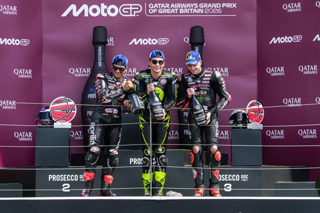 Jorge Martin (Spain) of the Aprilia Racing ( 89) (2nd), Raul Fernandez (Spain) of the SuperFile Trackhouse MotoGP Team ( 25) (1st) and Marco Bezzecchi (Italy) of the Aprilia Racing ( 72) (3rd) on the podium after the MotoGP Race at Round 12 of the 2026 Qatar Airways Grand Prix of Great Britain at Silverstone Circuit, Towcester, England on the 9 August 2026.  Copyright: xDavidxHornx PMI-7310-0294