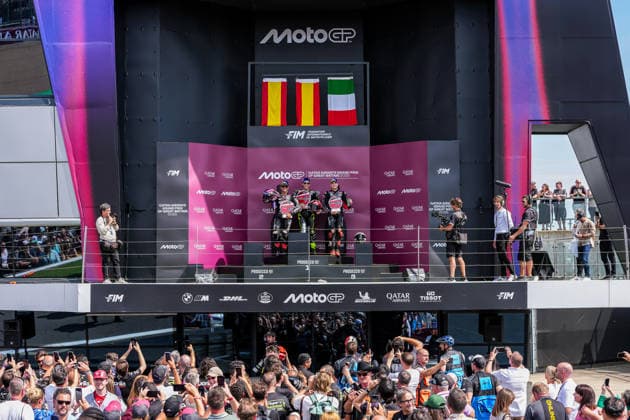 Jorge Martin (Spain) of the Aprilia Racing ( 89) (2nd), Raul Fernandez (Spain) of the SuperFile Trackhouse MotoGP Team ( 25) (1st) and Marco Bezzecchi (Italy) of the Aprilia Racing ( 72) (3rd) on the podium after the MotoGP Race at Round 12 of the 2026 Qatar Airways Grand Prix of Great Britain at Silverstone Circuit, Towcester, England on the 9 August 2026.  Copyright: xDavidxHornx PMI-7310-0295