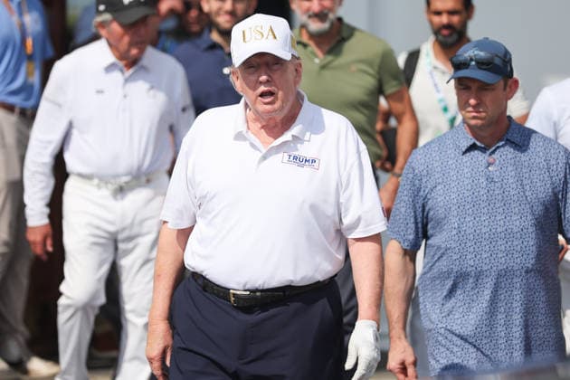 BEDMINSTER, NJ - AUGUST 09: President Donald Trump walks out of the clubhouse at Bedminster before the forth round of LIV Golf New York on August 9, 2026 at Trump National Golf Club in Bedminster, New Jersey. (Photo by Andrew Mordzynski Icon Sportswire) GOLF: AUG 09 LIV Golf New York EDITORIAL USE ONLY Icon2608098162827