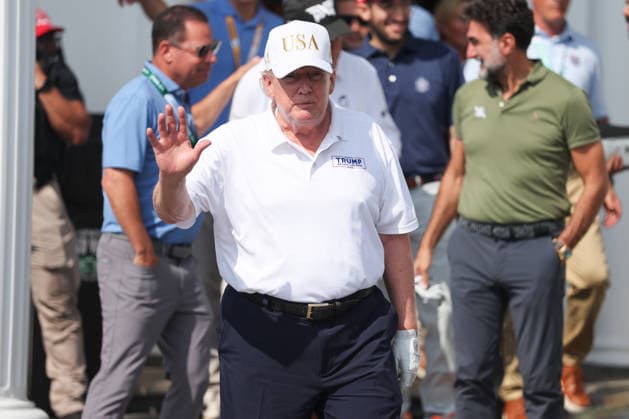 BEDMINSTER, NJ - AUGUST 09: President Donald Trump walks out of the clubhouse at Bedminster before the forth round of LIV Golf New York on August 9, 2026 at Trump National Golf Club in Bedminster, New Jersey. (Photo by Andrew Mordzynski Icon Sportswire) GOLF: AUG 09 LIV Golf New York EDITORIAL USE ONLY Icon2608098162830