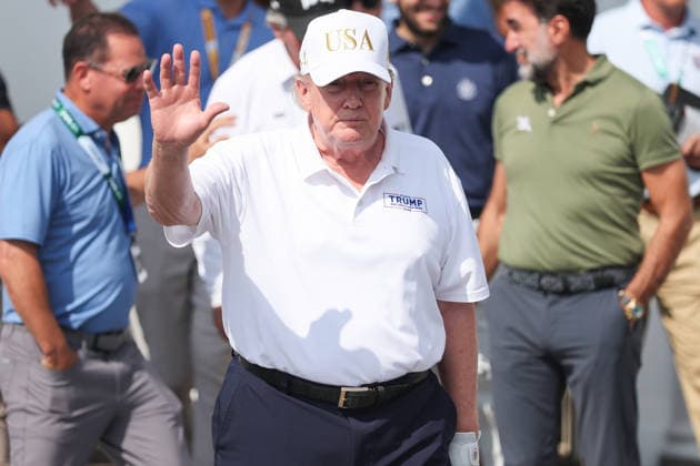 BEDMINSTER, NJ - AUGUST 09: President Donald Trump walks out of the clubhouse at Bedminster before the forth round of LIV Golf New York on August 9, 2026 at Trump National Golf Club in Bedminster, New Jersey. (Photo by Andrew Mordzynski Icon Sportswire) GOLF: AUG 09 LIV Golf New York EDITORIAL USE ONLY Icon2608098162832