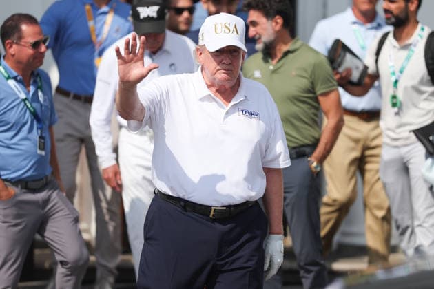 BEDMINSTER, NJ - AUGUST 09: President Donald Trump walks out of the clubhouse at Bedminster before the forth round of LIV Golf New York on August 9, 2026 at Trump National Golf Club in Bedminster, New Jersey. (Photo by Andrew Mordzynski Icon Sportswire) GOLF: AUG 09 LIV Golf New York EDITORIAL USE ONLY Icon2608098162841
