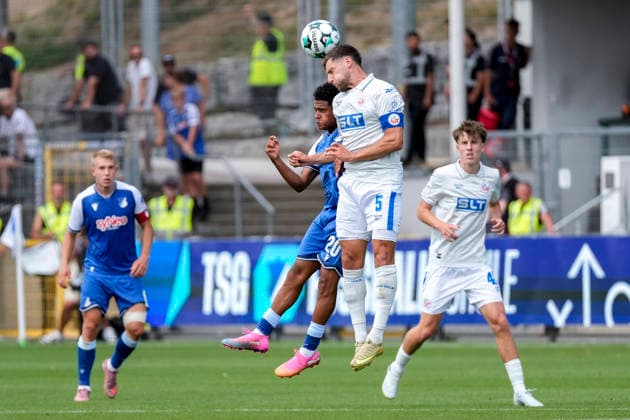 v.li.: Tiago Poller (TSG II, 20), Marco Schuster (Rostock, 5), beim Kopfball, Kopfballduell, Spielszene, Zweikampf in der Luft, Aktion, Action, 09.08.2026, Sinsheim (Deutschland), Fussball, 3. Liga, TSG 1899 Hoffenheim II - Hansa Rostock, DFB DFL REGULATIONS PROHIBIT ANY USE OF PHOTOGRAPHS AS IMAGE SEQUENCES AND OR QUASI-VIDEO. *** v li Tiago Poller TSG II, 20, Marco Schuster Rostock, 5, heading the ball, aerial duel, game scene, aerial challenge, action, 09 08 2026, Sinsheim, Germany, soccer, 3rd Division, TSG 1899 Hoffenheim II vs. Hansa Rostock, DFB and DFL regulations prohibit any use of photographs as image sequences and or quasi-video xozx