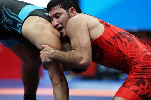 (260809) -- XI AN, Aug. 9, 2026 -- Sherzod Poyonov (R) of Uzbekistan and Habila Awusayiman of China compete during the men s freestyle 97kg final at 2026 China-Central Asia Elite Wrestling Tournament in Xi an, northwest China s Shaanxi Province, Aug. 9, 2026. ) (SP)CHINA-XI AN-WRESTLING-2026 CHINA-CENTRAL ASIA ELITE WRESTLING TOURNAMENT (CN) LixYibo 